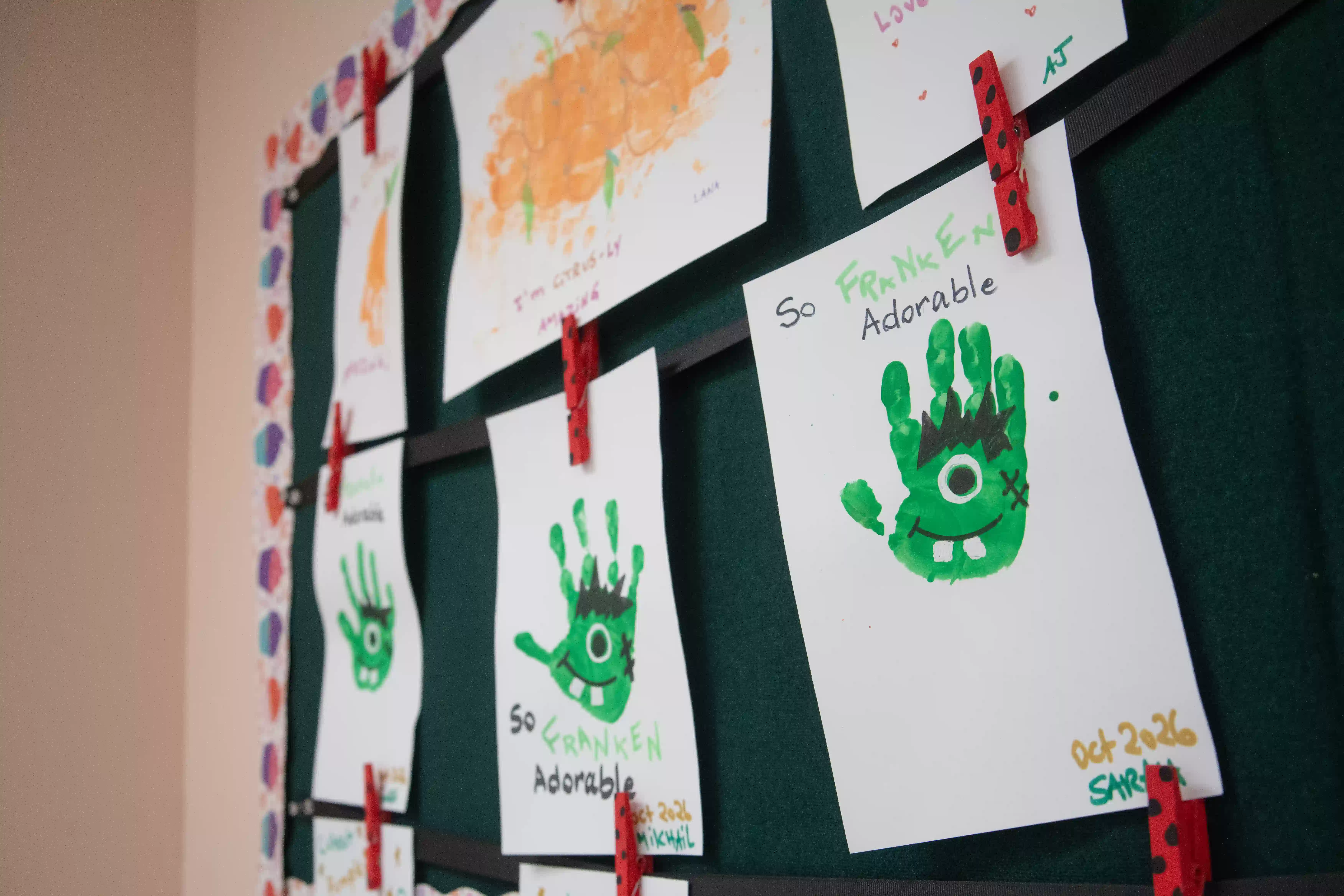 Handprint art on the classroom wall